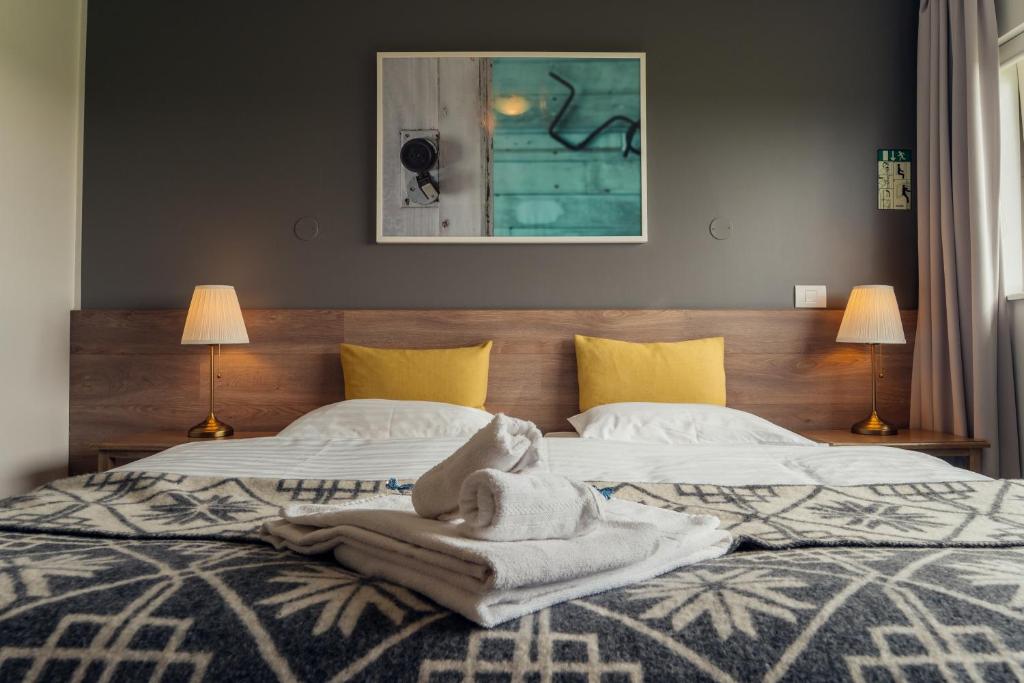 Postel nebo postele na pokoji v ubytování Farmhouse Lodge