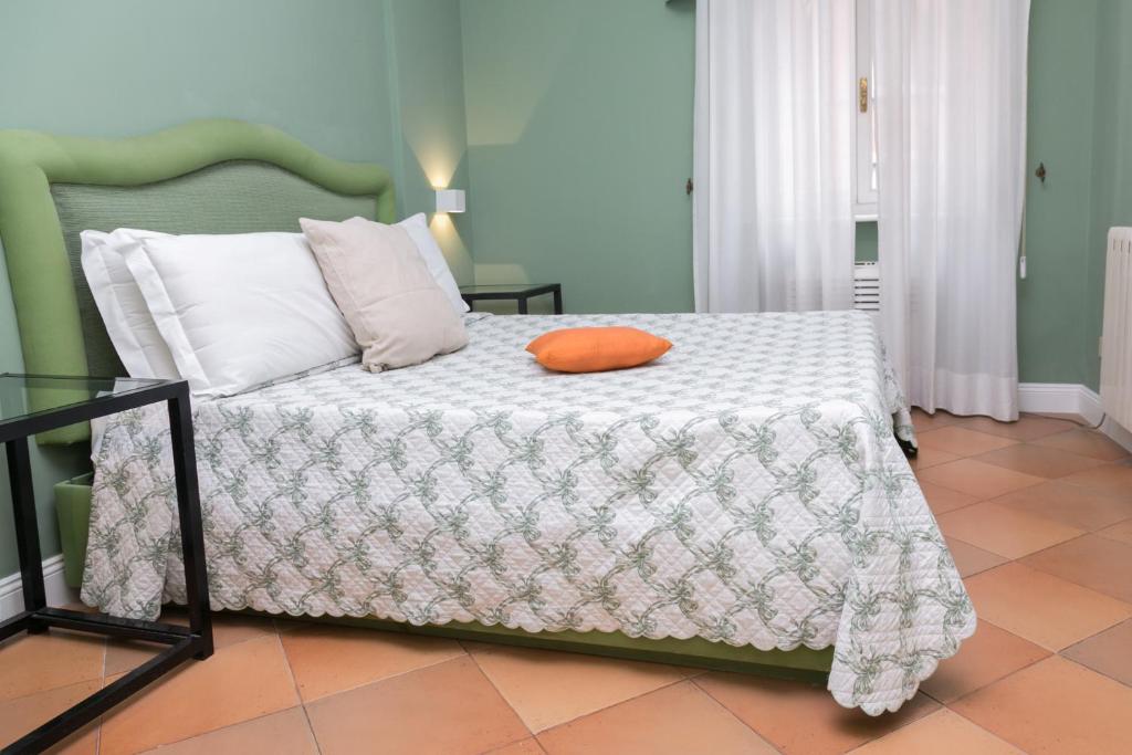 Posteľ alebo postele v izbe v ubytovaní Rasella Suites 47