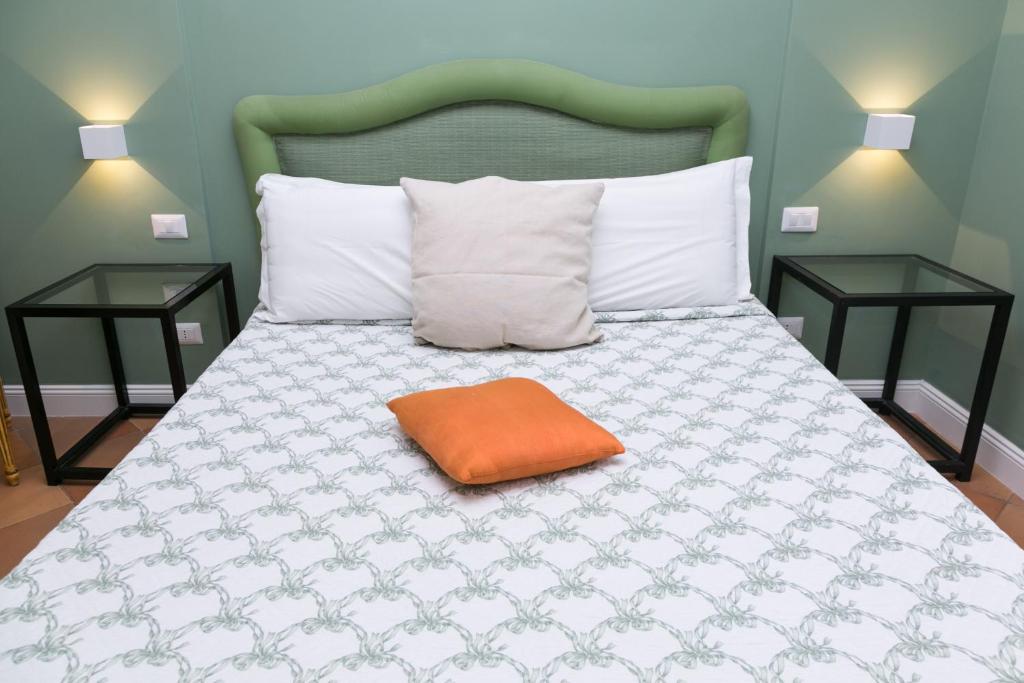 Posteľ alebo postele v izbe v ubytovaní Rasella Suites 47