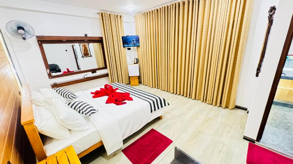Postel nebo postele na pokoji v ubytování Vibe Ella