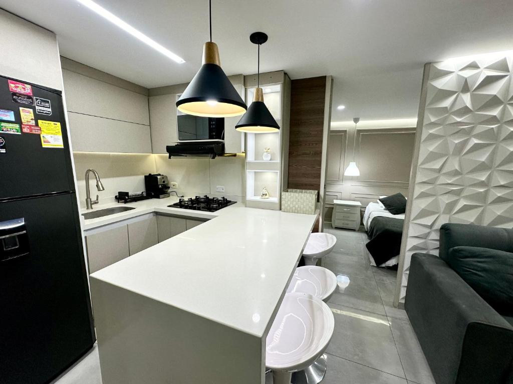 Kuchyň nebo kuchyňský kout v ubytování Apartamento luxury Girardot