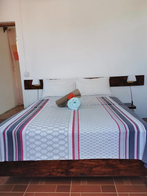 Postel nebo postele na pokoji v ubytování Hebergement Vue Sur Mer