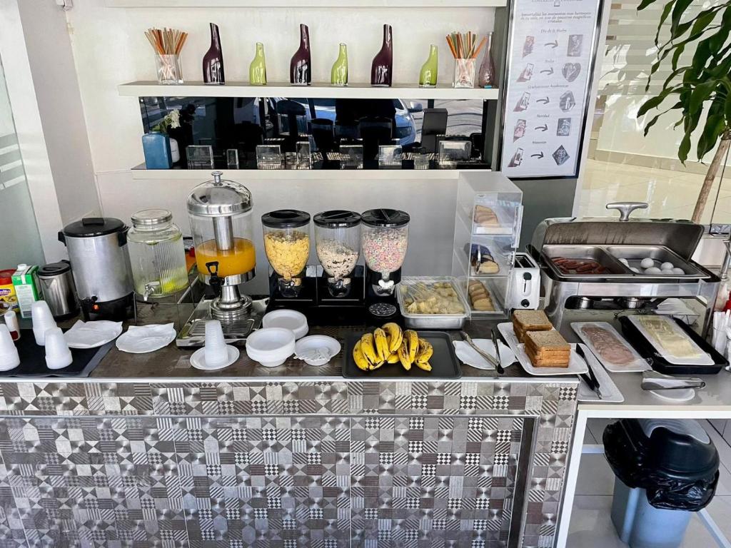 Kuchyň nebo kuchyňský kout v ubytování City Caribbean Hotel Boutique