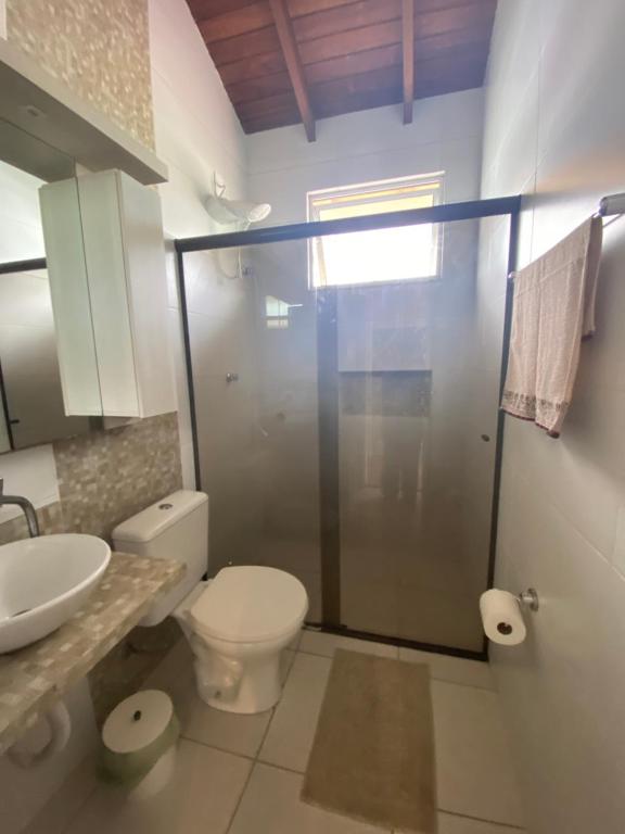 Koupelna v ubytování Quartos confortáveis com vista