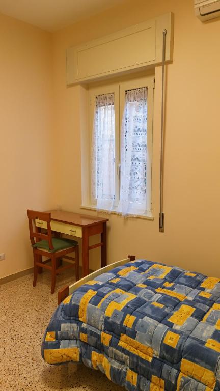 Postel nebo postele na pokoji v ubytování Casa per ferie Maria Ausiliatrice