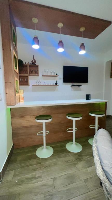 TV a/nebo společenská místnost v ubytování Caribbean Villa 32 Punta Cana