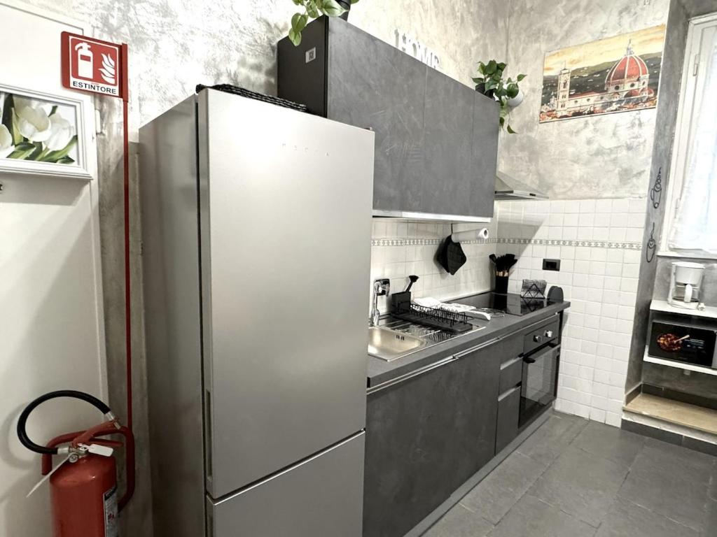 Kuchyň nebo kuchyňský kout v ubytování Nest In Florence 27