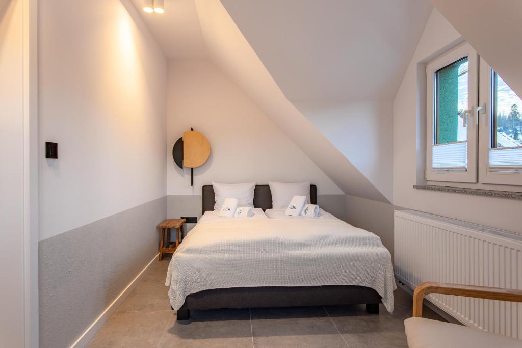 Postel nebo postele na pokoji v ubytování Apart-Invest Gimnazjalna 9