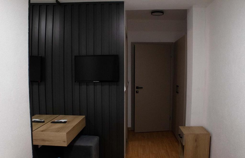 TV a/nebo společenská místnost v ubytování Hotel Cingo