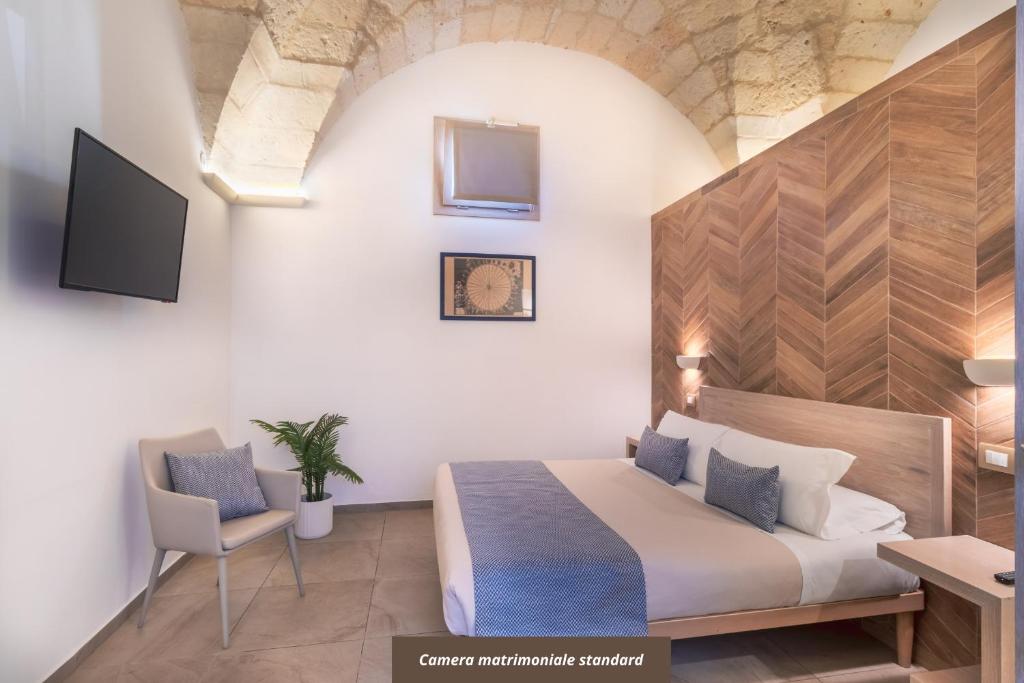 TV a/nebo společenská místnost v ubytování Palazzo San Lazzaro - Jacuzzi Rooms & Suites Lecce Selection