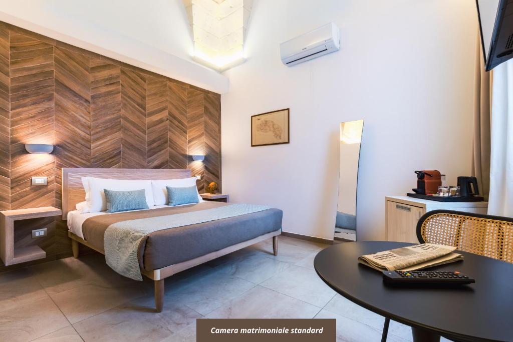 Postel nebo postele na pokoji v ubytování Palazzo San Lazzaro - Jacuzzi Rooms & Suites Lecce Selection