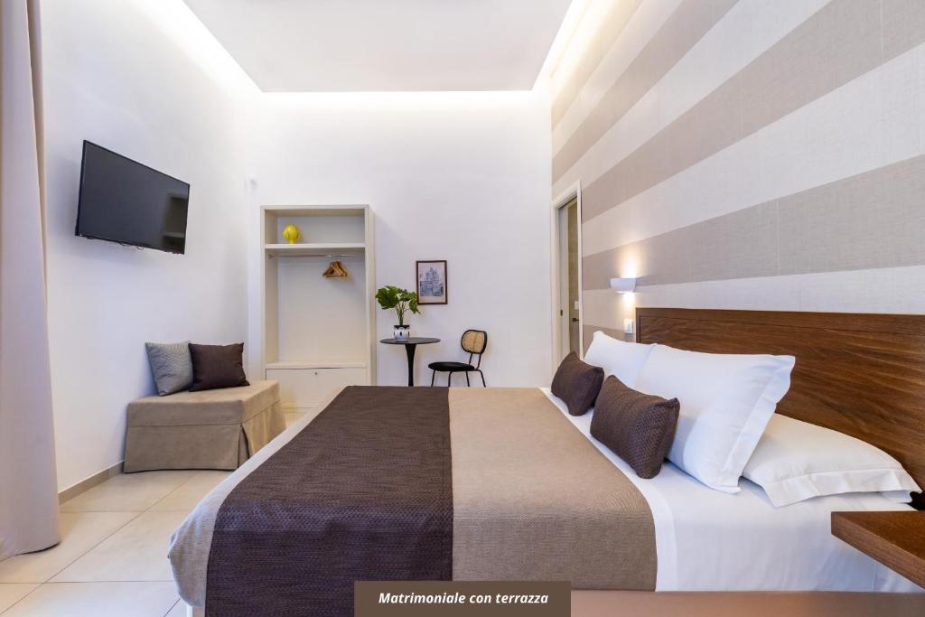 Postel nebo postele na pokoji v ubytování Palazzo San Lazzaro - Jacuzzi Rooms & Suites Lecce Selection