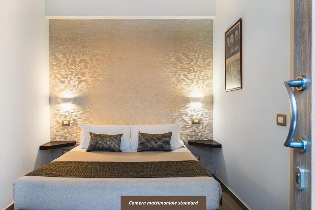 Postel nebo postele na pokoji v ubytování Palazzo San Lazzaro - Jacuzzi Rooms & Suites Lecce Selection