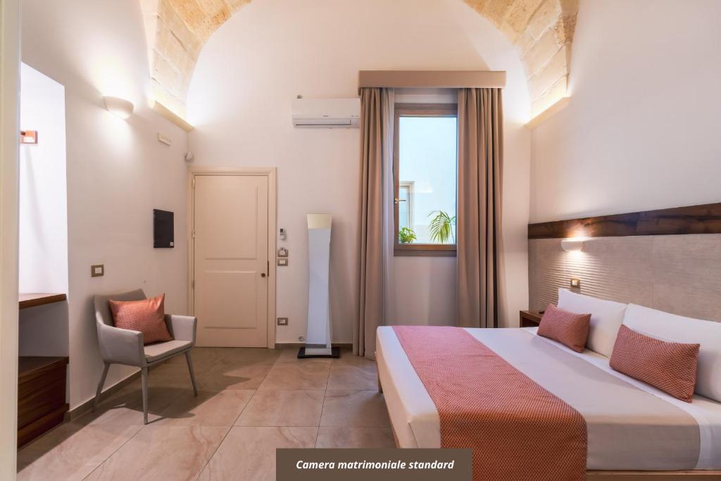 Postel nebo postele na pokoji v ubytování Palazzo San Lazzaro - Jacuzzi Rooms & Suites Lecce Selection
