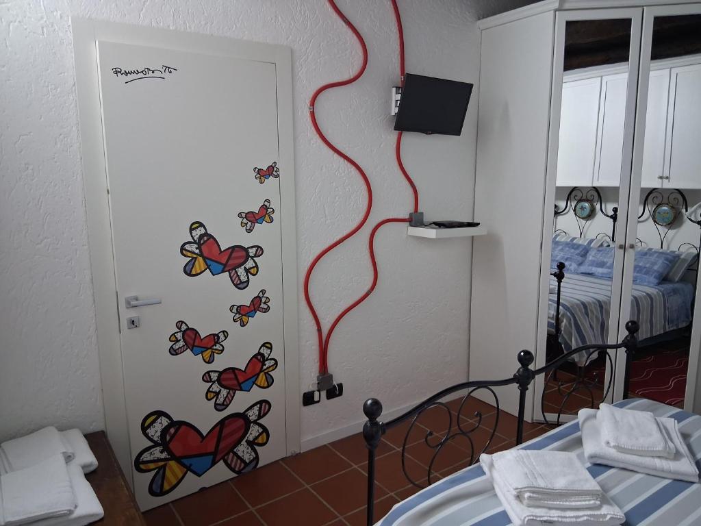 Łóżko lub łóżka w pokoju w obiekcie Il Sasso appartamento