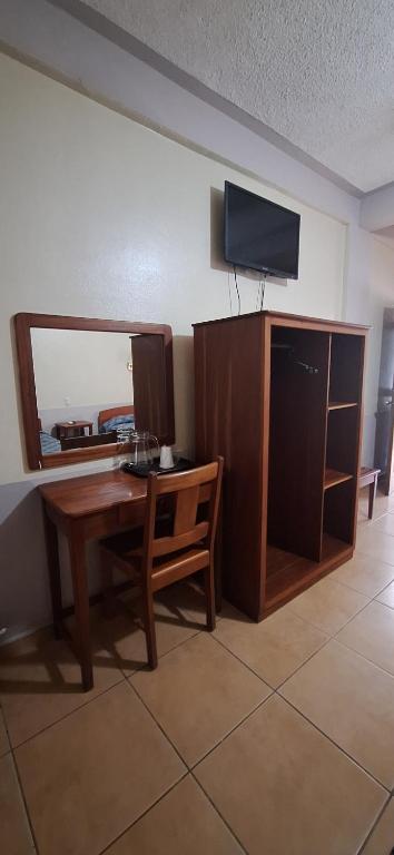 TV a/nebo společenská místnost v ubytování Hotel Playa Bonita Tela