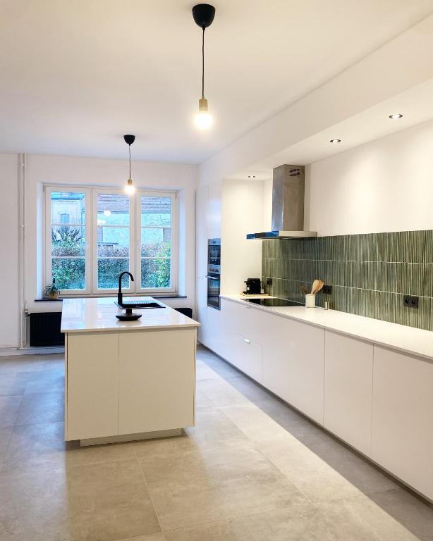 Kuchyň nebo kuchyňský kout v ubytování Maison Hortensia