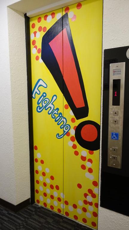 a vending machine with a large pepsi sign on it at Century Hotel in Kaohsiung
