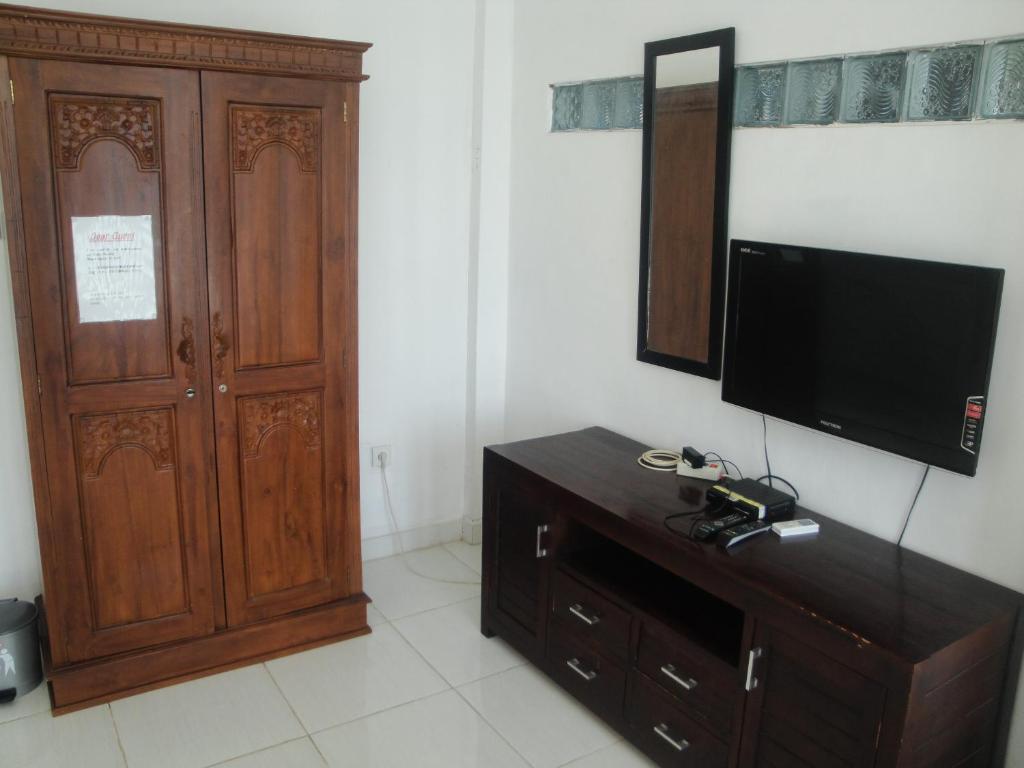 TV a/nebo společenská místnost v ubytování Spear Beach House
