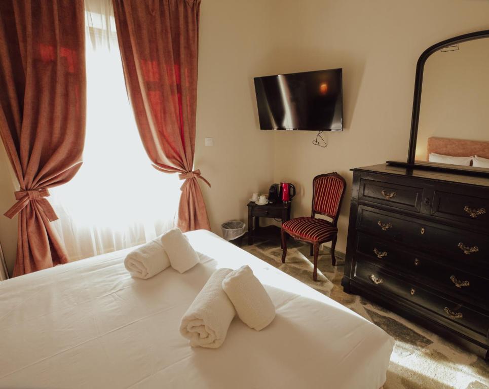 Postel nebo postele na pokoji v ubytování Aurora-Inn