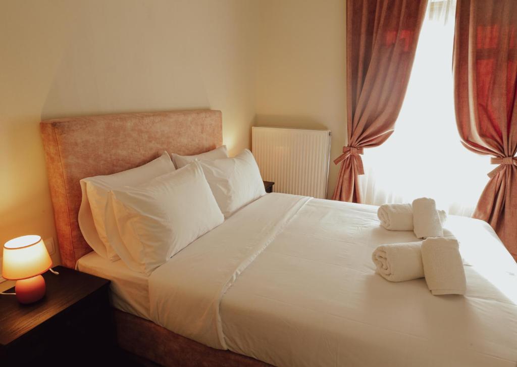 Postel nebo postele na pokoji v ubytování Aurora-Inn