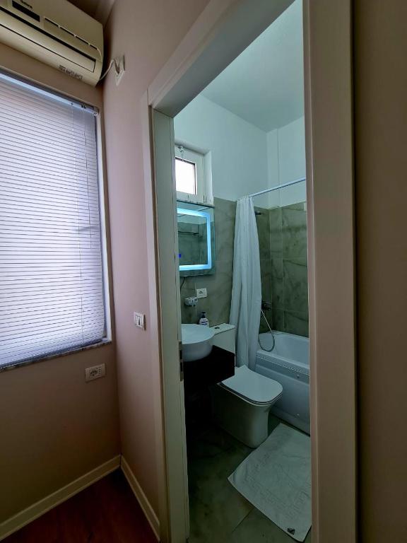 Koupelna v ubytování DION Apartment