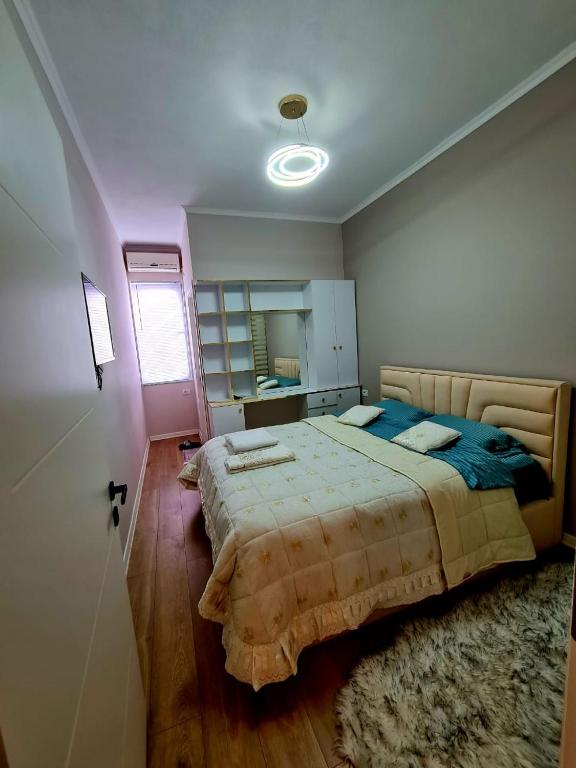 Postel nebo postele na pokoji v ubytování DION Apartment