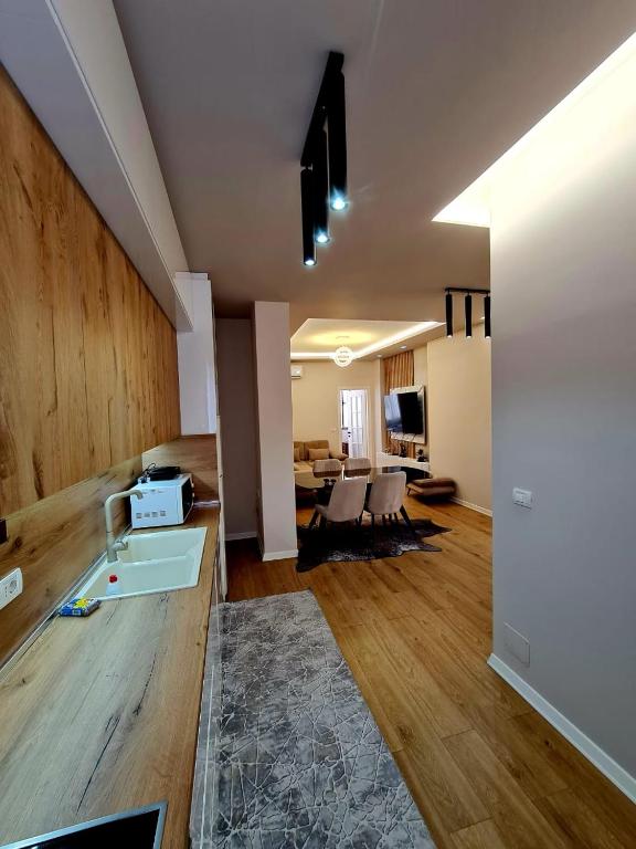 TV a/nebo společenská místnost v ubytování DION Apartment
