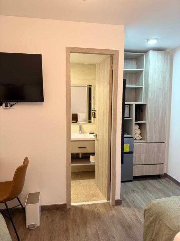 TV a/nebo společenská místnost v ubytování ESHEL SUITES PANAMA