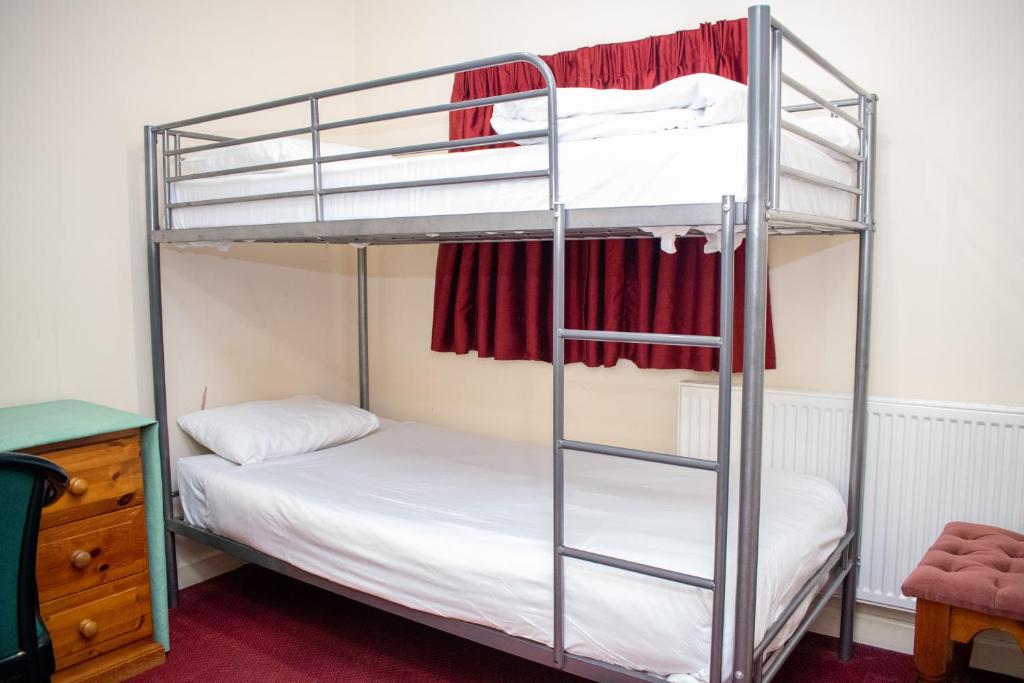 Postel nebo postele na pokoji v ubytování Royal Square Hotel - NEC & Birmingham Airport