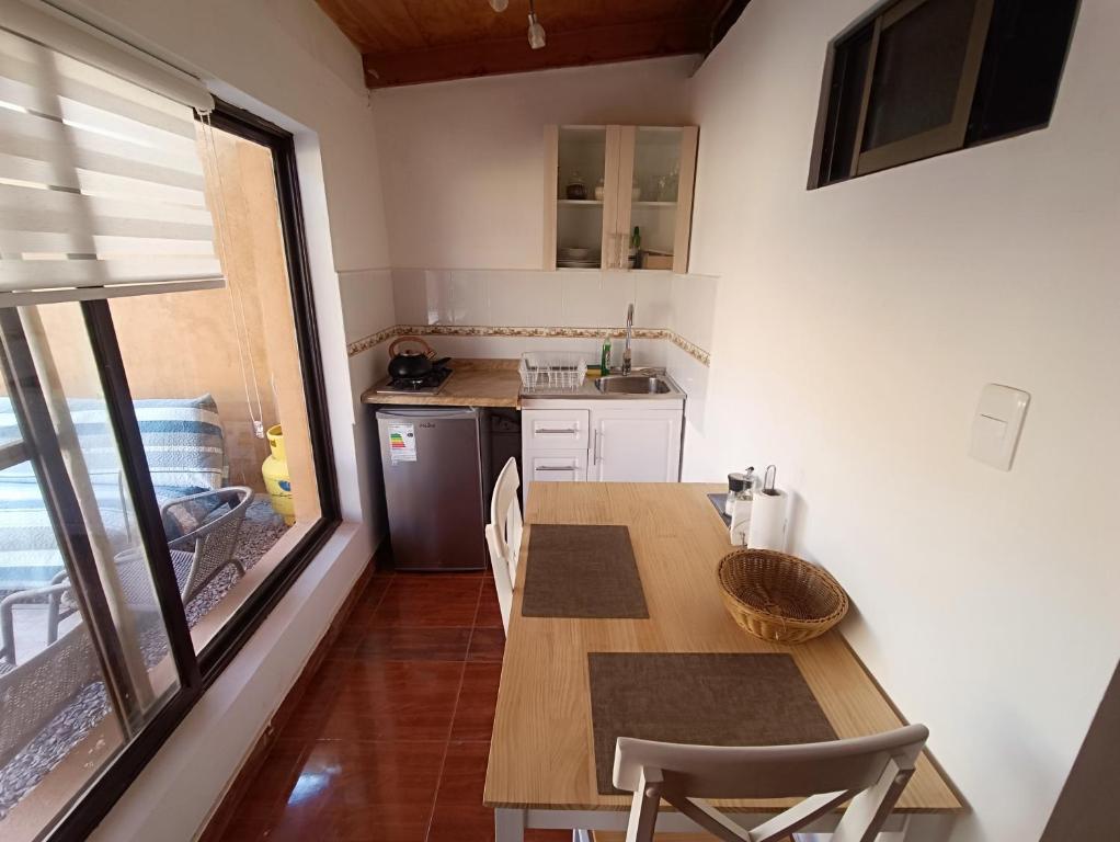 Kuchyň nebo kuchyňský kout v ubytování Hostal Yurak