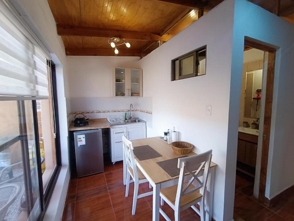 Kuchyň nebo kuchyňský kout v ubytování Hostal Yurak