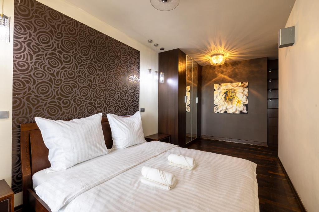 Postel nebo postele na pokoji v ubytování Gaverskyi Apartment FREE PARKING nad Odrą