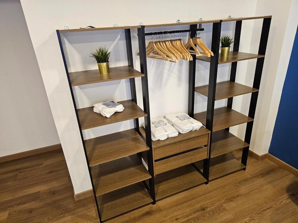 Postel nebo postele na pokoji v ubytování Suite urbana