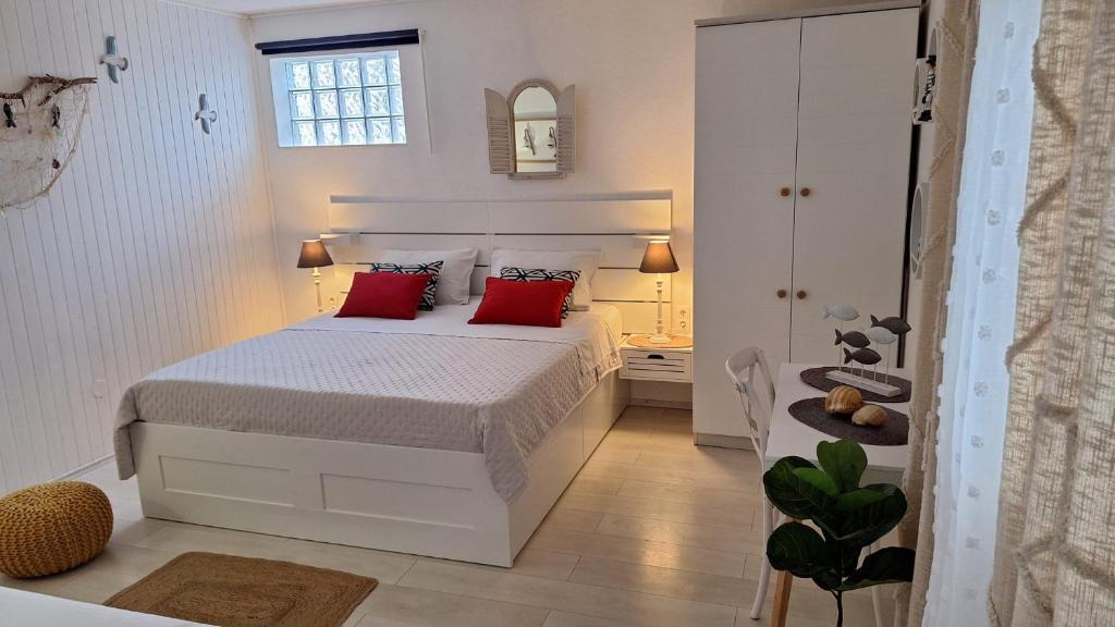 Postel nebo postele na pokoji v ubytování Apartments Teo 1