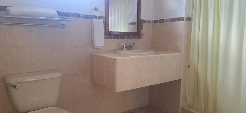 Koupelna v ubytování Hotel Playa Bonita Tela
