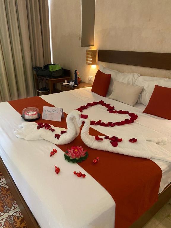 Una cama o camas en una habitación de Hotel Boutique SAYAB