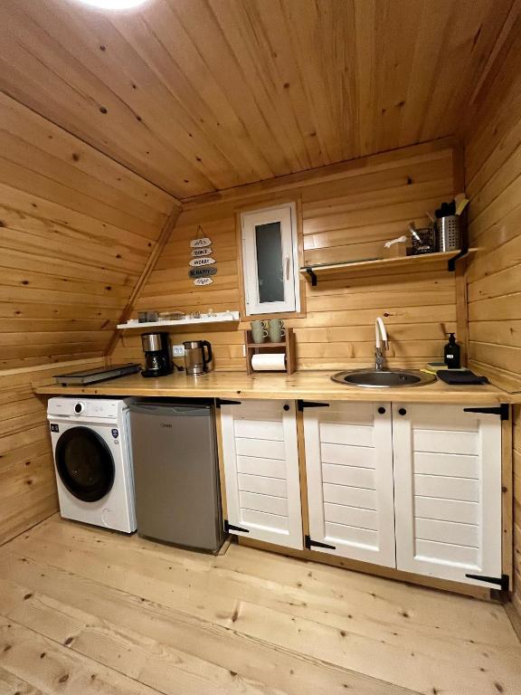 Kuchyň nebo kuchyňský kout v ubytování Serenity Place