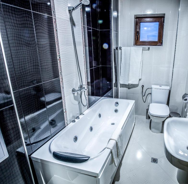 Koupelna v ubytování Hotel Nikol