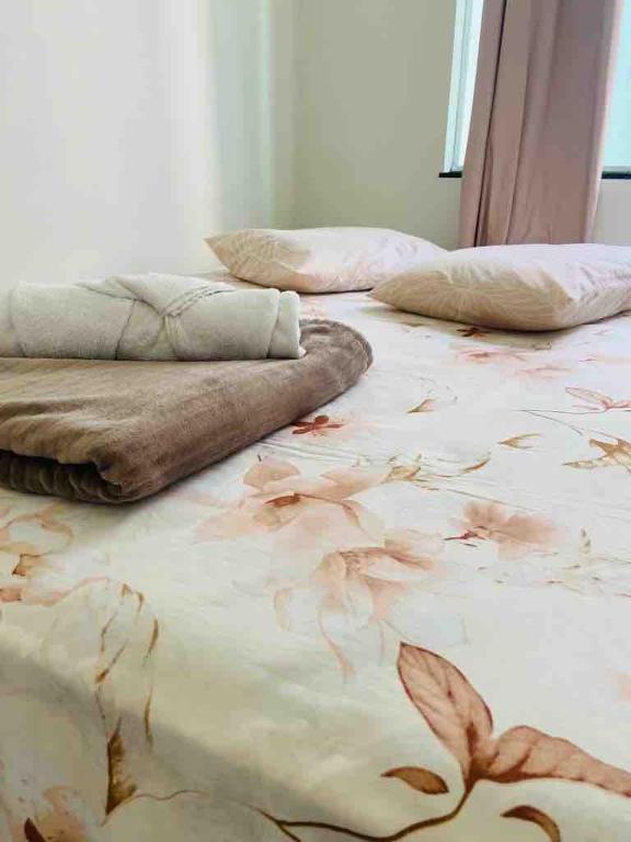 Postel nebo postele na pokoji v ubytování Local aconchegante e super prático