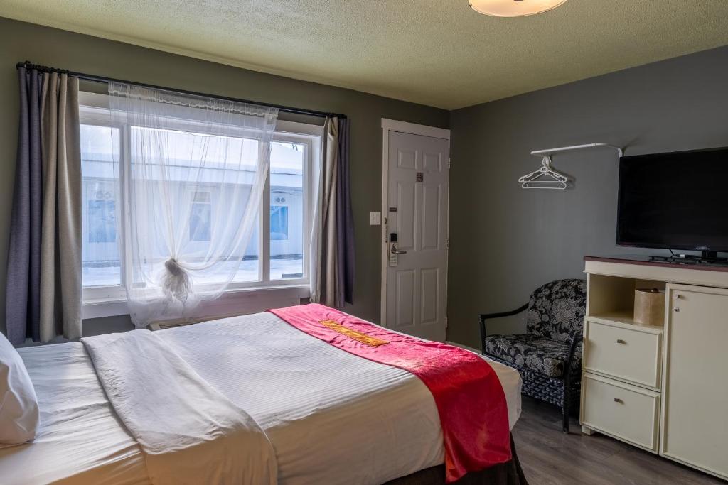 Postel nebo postele na pokoji v ubytování Ace Motel