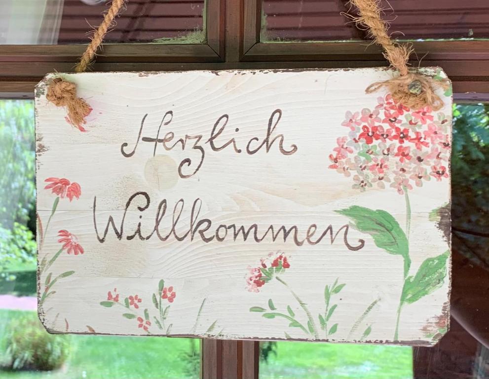 a sign that reads harritch and williams at Ferienhaus Schnuckenheide 13 in Winsen Aller