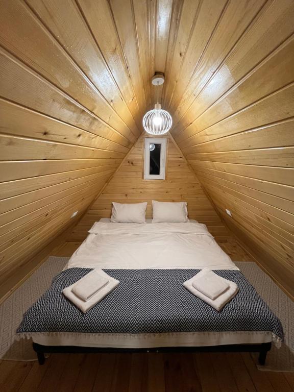 Postel nebo postele na pokoji v ubytování Serenity Place