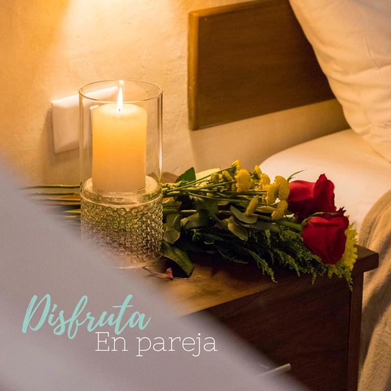 Una cama o camas en una habitación de Hotel Boutique SAYAB