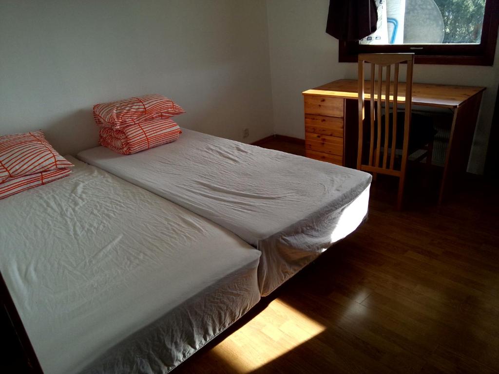 Postel nebo postele na pokoji v ubytování Gardenview Room