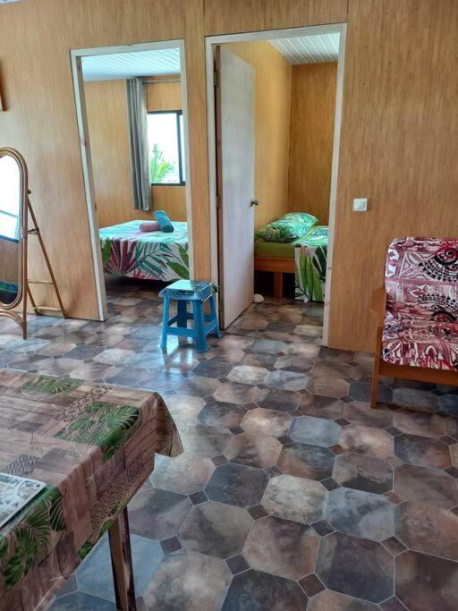 Postel nebo postele na pokoji v ubytování Ohotu-Rangiroa house