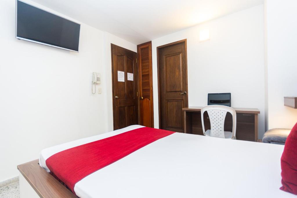 TV a/nebo společenská místnost v ubytování Hotel Bicentenario Rionegro