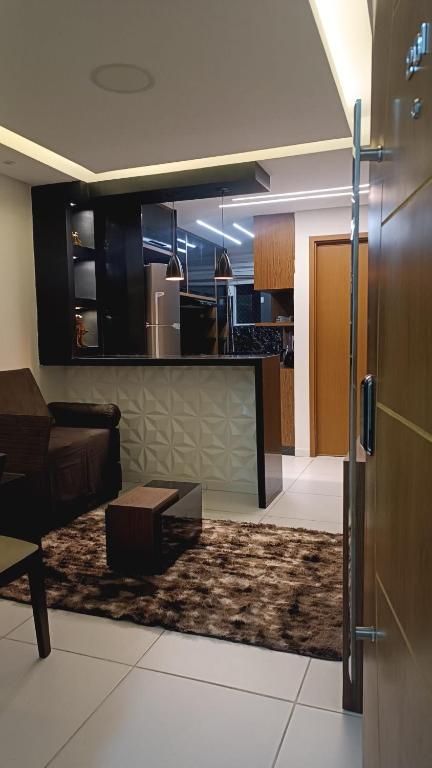 Kuchyň nebo kuchyňský kout v ubytování Apto com ar, lazer, conforto e portaria 24h ideal para famílias!
