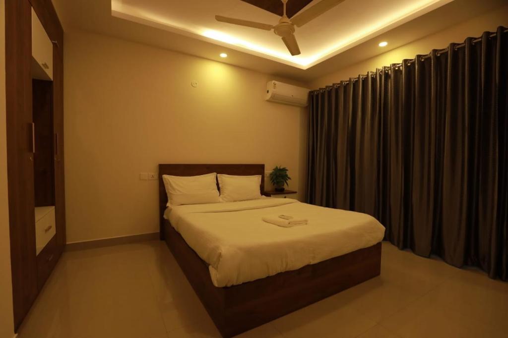 Ένα ή περισσότερα κρεβάτια σε δωμάτιο στο Platinum Apartments