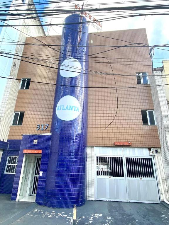 a building with a mural on the side of it at Hotel Atlanta - Salvador - BA in Salvador